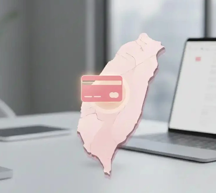 畫面以台灣地圖輪廓為主體，中央疊加信用卡圖示，背景為筆電與辦公桌環境，象徵台灣地區的數位支付、信用卡服務或金融科技應用發展示意。